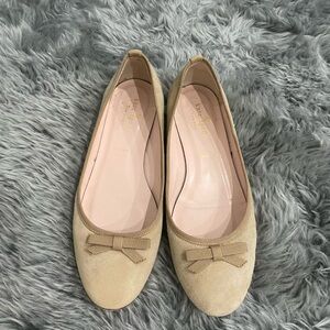 Kate Spade flats.